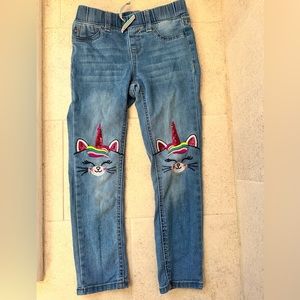 Girls skinny jeans with unicorn patch knees